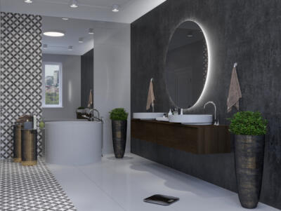 Ronde spiegel met verlichting, hangend in een badkamer